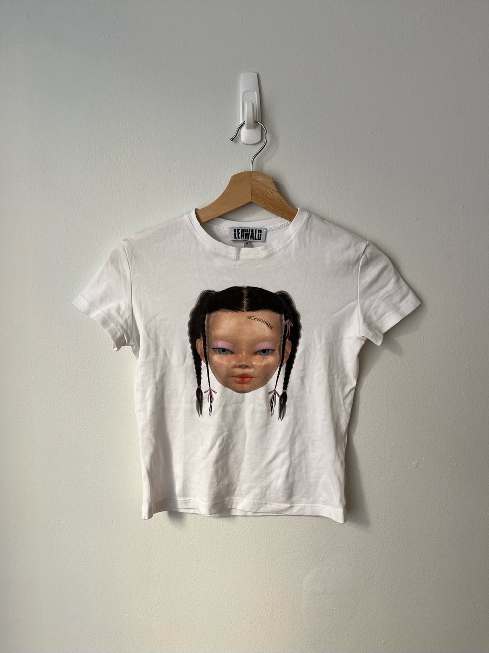 White Graphic Tank-Style Tee with Doll Face Print